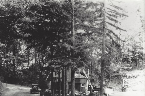 Redwood Estates entrance. The Dutch windmill was built to catch the attention of passing motorists and attract them to the sales office located immediately behind the windmill. [Bruce Kennedy Collection] Photo: Courtesy of Richard Beal.