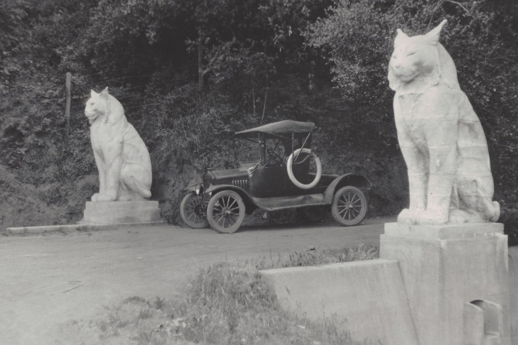 The famous "cats" guarding the toad to Poet's Canyon in 1925. The automobile is a Ford Model T (notice the spare inner tube for the tires). [William A. Wulf Collection] Photo: Courtesy of Richard Beal.