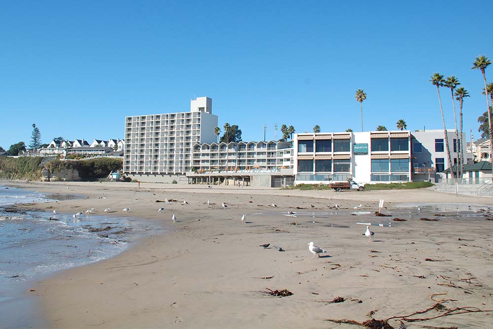 Cowell Beach. Today the Dream Inn occupies the back edge of the beach.