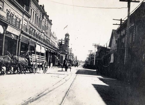 The clock in its original location above Pacific Avenue between Cooper and Church Streets. Photo courtesy of the Santa Cruz Museum of Art and History.