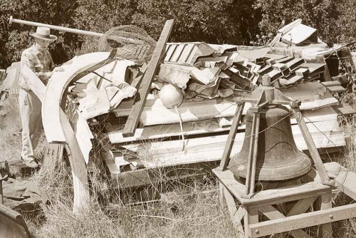 The Town Clock dismantled in a field circa 1970. Photo courtesy of the Santa Cruz Museum of Art and History.