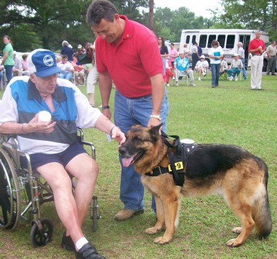 Jerome Lee and Lex meet with World War II Veterans.  Photo from Psc349.