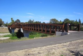 Bridging the Gap Between River and Community: The Pedestrian Bridge