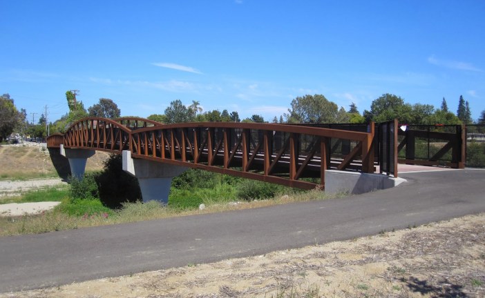 Bridging the Gap Between River and Community: The Pedestrian Bridge
