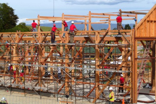 Reconstruction was well under way in March, 2015. The darker-colored timbers are ones salvaged from the original barn. Photo courtesy of the Friends of the Cowell Lime Works Historic District.
