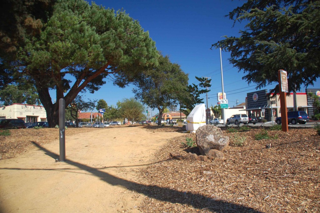 El Portal Park 2015. It's hard to imagine this tiny triangle surrounded by traffic as home to a library. 