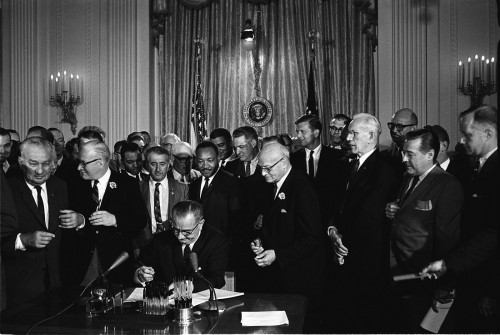Lyndon B. Johnson signing the Civil Rights Act of 1964. Photo: Cecil Stoughton, White House Press Office (WHPO)